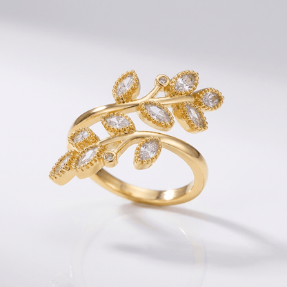 RING MED BLAD I GULD - (JUSTERBAR)