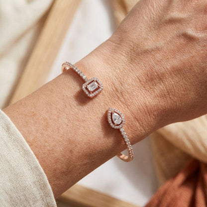 Armbånd med to sten i guld