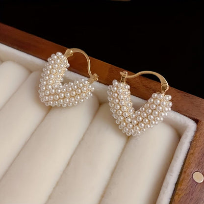 Heart earrings with pearl work