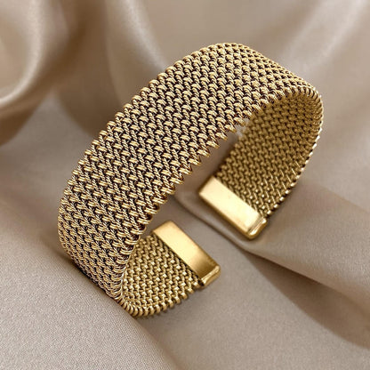 Vævet justerbart armbånd forgyldt
