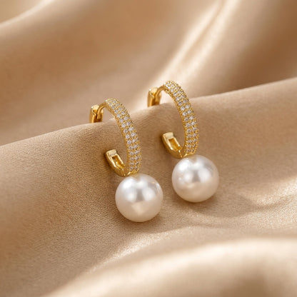 Elegant light gold-plated pearl earrings