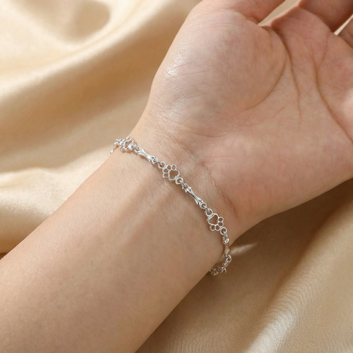 Limited edition pure silver bracelet with dog paws and bones