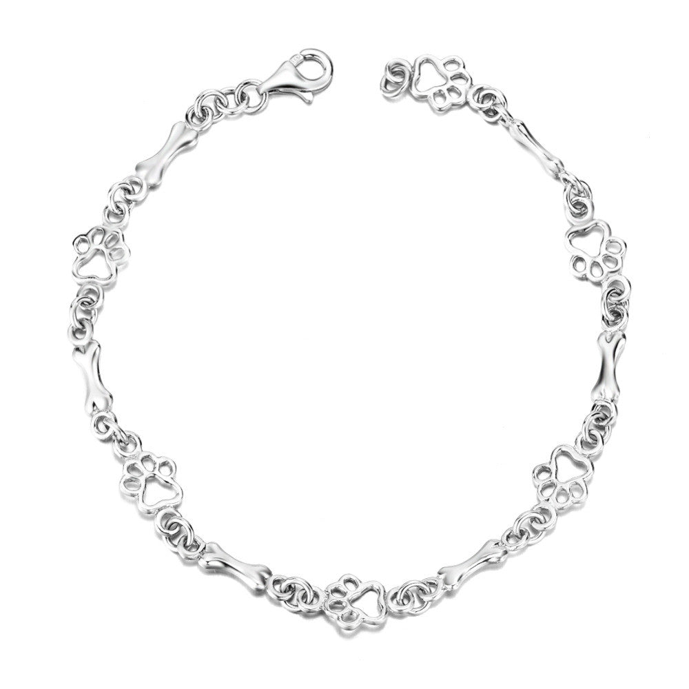 Limited edition pure silver bracelet with dog paws and bones