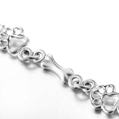 Limited edition pure silver bracelet with dog paws and bones