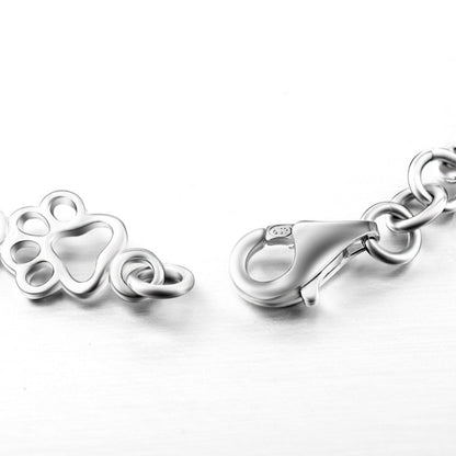 Limited edition pure silver bracelet with dog paws and bones