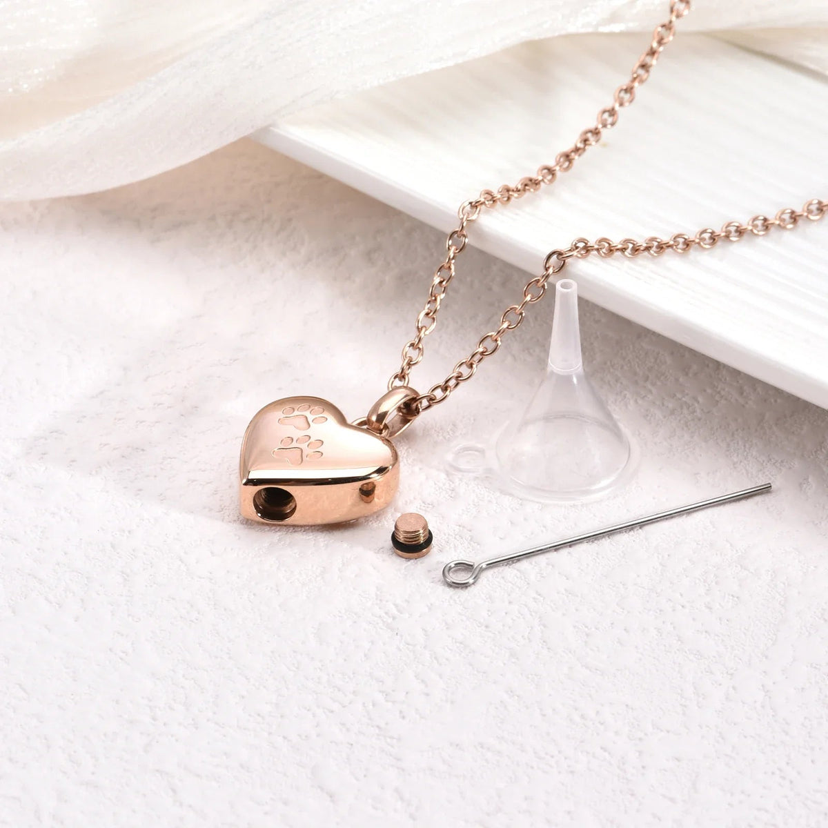 Pet Urn Necklace – Heart-shaped Pendant with Laser Engraving.