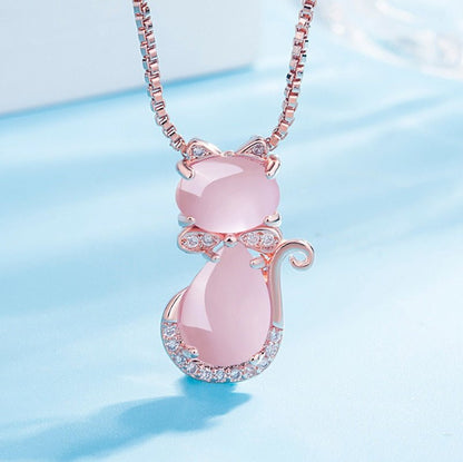 Necklace with pink stone and zircon.