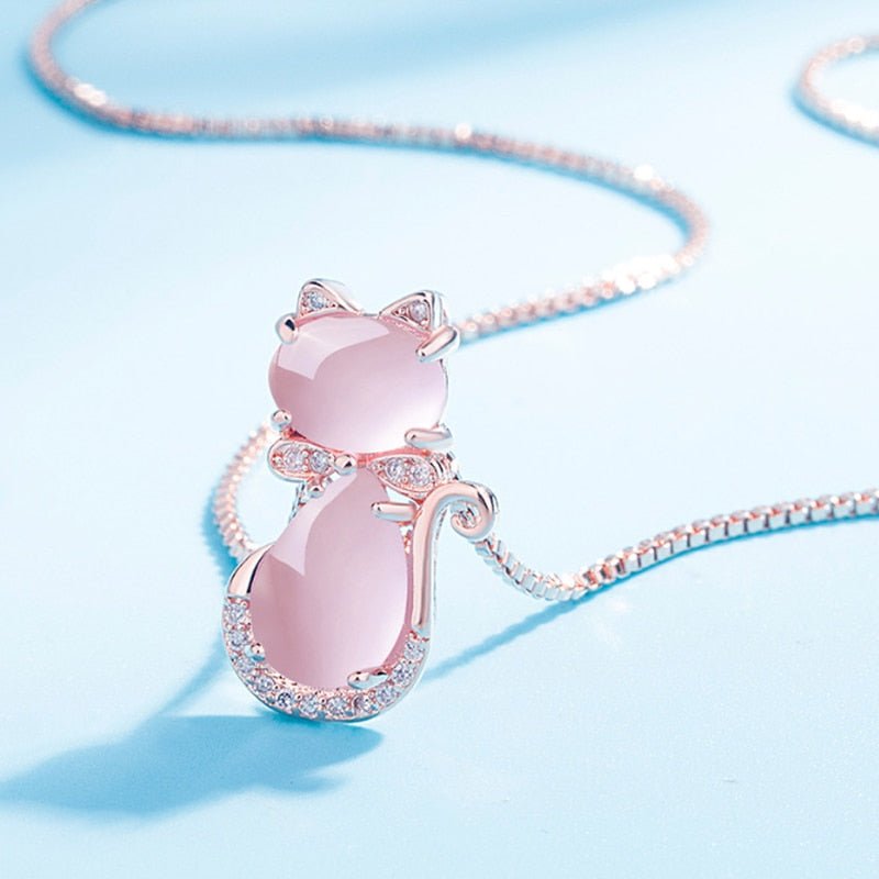 Necklace with pink stone and zircon.