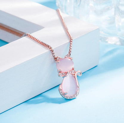 Necklace with pink stone and zircon.