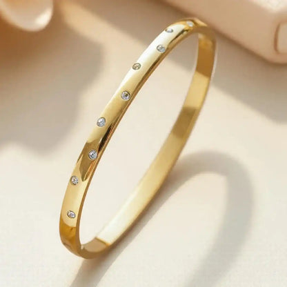 Tidløst forgyldt zirconia-armbånd