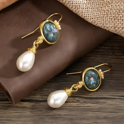 Geometric earrings with black stone and pearl
