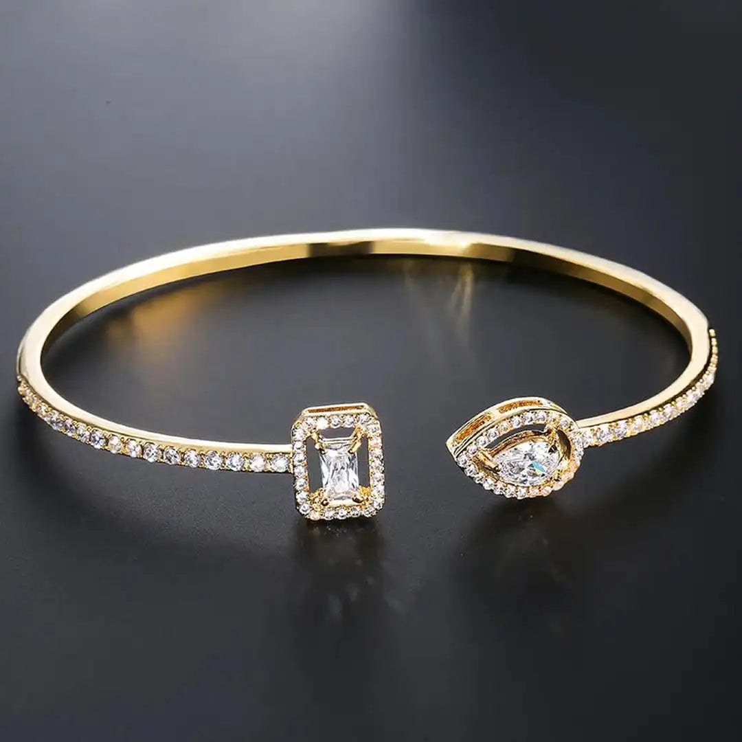 Armbånd med to sten i guld