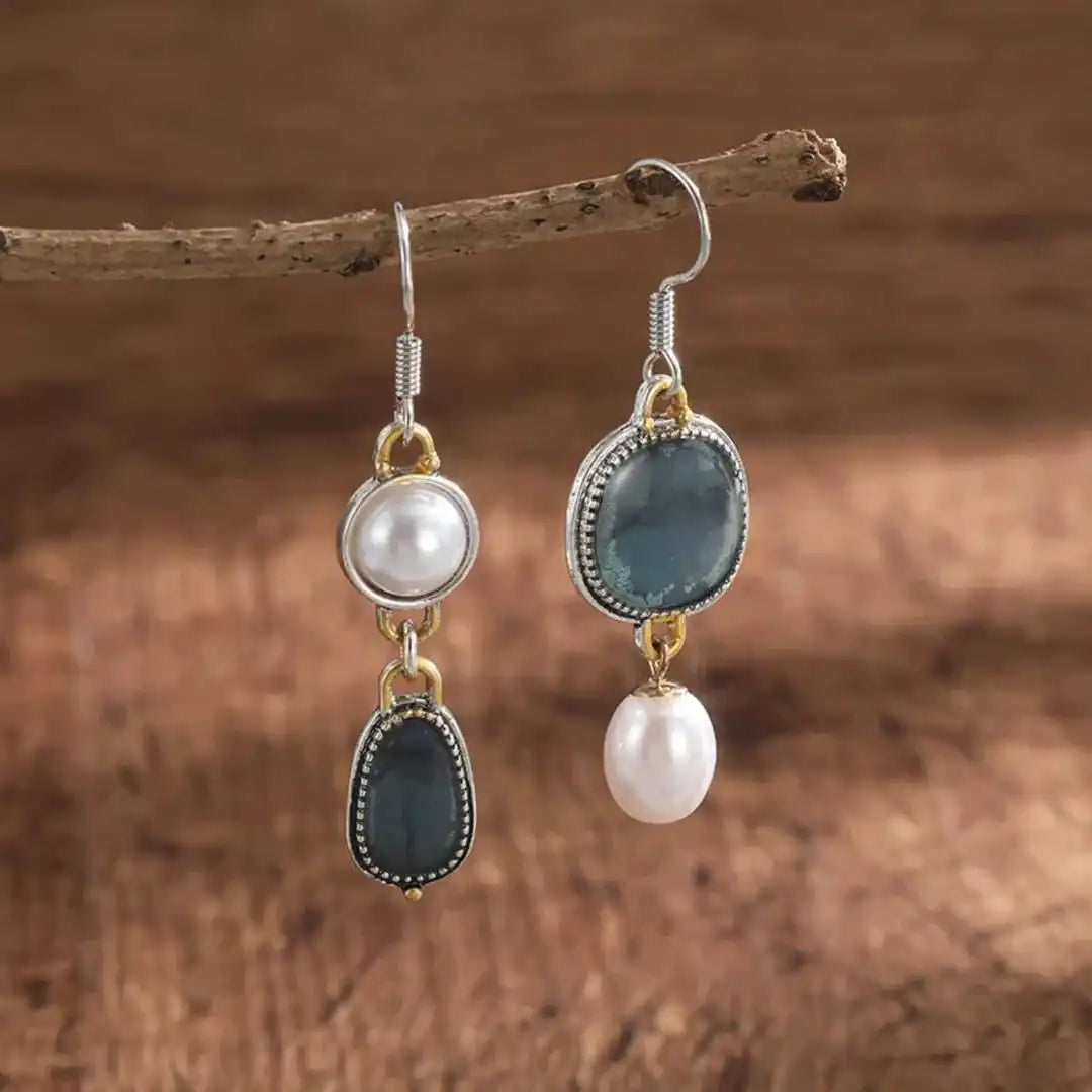 Vintage earrings with blue stones and a pearl