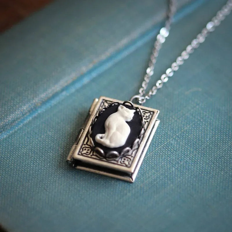 Vintage necklace with cat book pendant – rotating side design
