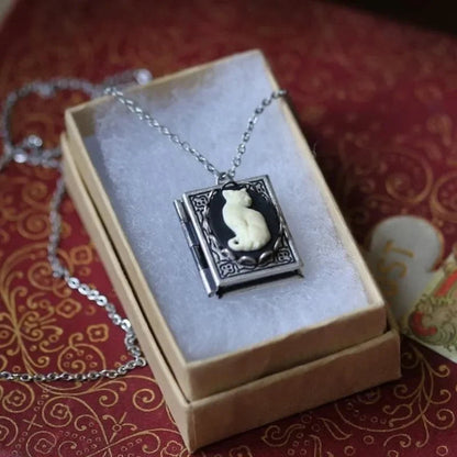 Vintage necklace with cat book pendant – rotating side design