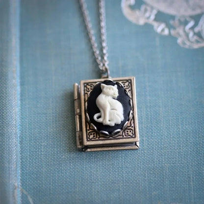 Vintage necklace with cat book pendant – rotating side design