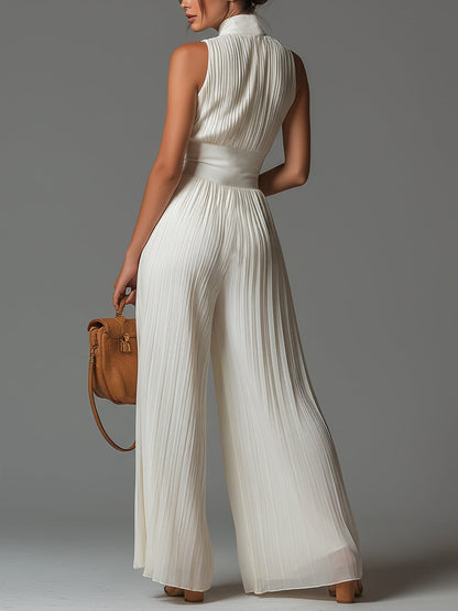 ZSÓFIA JUMPSUIT – PLISSERET CHIFFON MED BLOMSTER