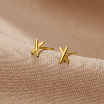 Annah – Guldøreringe i forma af en kvist.